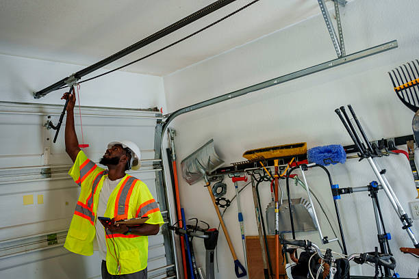 Professional Garage Door Panel Replacement technician working in River Falls, WI